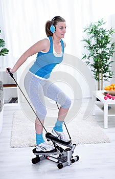 Women exercising on stepper