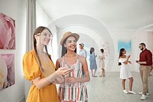 Women at exhibition in art gallery