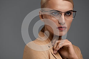 Women Eyewear. Beautiful Business Woman In Black Fashion Glasses