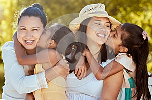 Women, family and face kids kiss in a nature park with mother and daughter spending quality time together. Portrait of