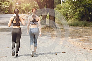 women friend walking together outdoor relax leisure for sport recreation in the morning