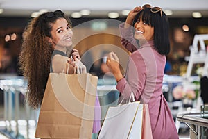 Women, friends and shopping in mall, portrait and happiness, smile and excited to buy luxury products, fashion and