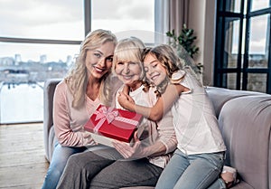 Women generation at home. Daughter, mother and grandmother spending time together. Celebrating Mother`s Day