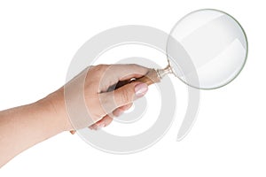 Women hand holding magnifying glass isolated on white background