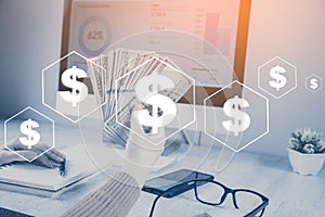 women hand money with keyboard on desk.