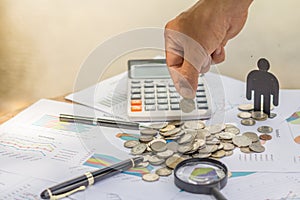 Women hand put money coins to stack of coins. Business Growth co