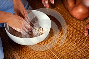 Women hand thresh flour in enameled bowl for make cooking dessert