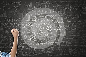 Women hand writing on blackboard