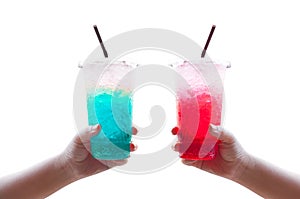 Women handle holding ice water italian soda red and blue in plastic cup