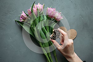 Women hands and flowers Women`s Day