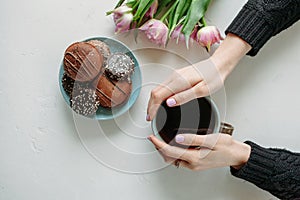 Women hands and flowers Women`s Day