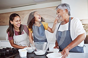 Women, happy family and bake food in kitchen smile together love cooking dessert and bonding at family home. Excited