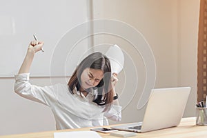 Women have a back pain because of the computer and working for a long time.