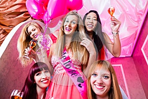 Women having bachelorette party in night club