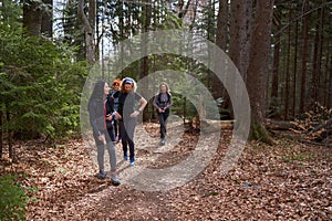 Women hikers with backpacks in the mountains