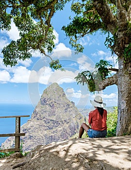 Women hiking in Saint Lucia Caribbean, nature trail in the jungle of Saint Lucia huge Pitons