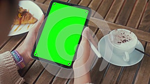 Women Holding Digital Tablet Green Screen On Table