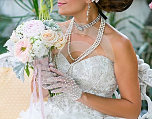 Women holding flowers and bouquet