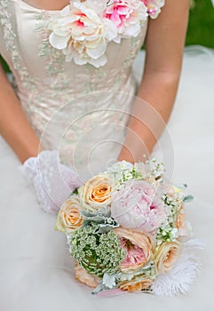 Women holding flowers and bouquet