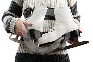 Women holding ice skates