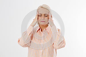 Women Hormonal Headaches. Middle aged woman with Menopause migraines isolated on white background. Copy space. Strong and hard