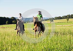 Women Horseback Riding in a Landscape