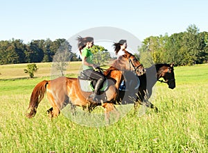 Women Horseback Riding in a Landscape