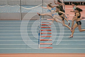 Women hurdlers race