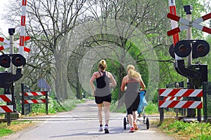 Mothers are jogging with baby in stroller, Tricht, Betuwe,Holland