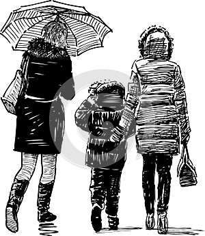 Women and kid on a walk