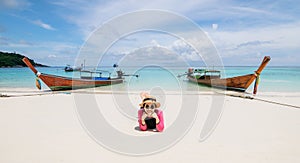 Women lie on the beach and the sea have a holiday summer relaxing and travel bright sky koh lipe