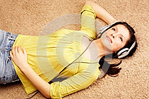 Women listening music in headphones