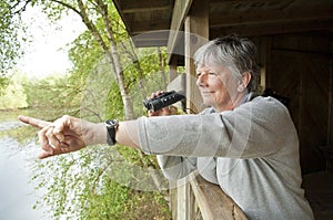 Women looking through binoculars