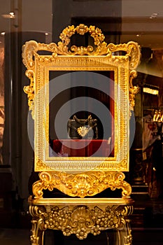 Women luxury handbag in a Dolce and Gabbana store in Milan. Fashion shop display. Luxury store appearance. Stylish woman