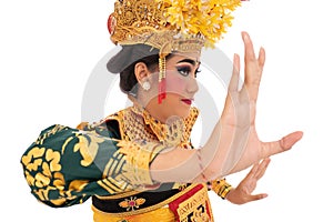 Women wear traditional dance clothes when dancing Balinese