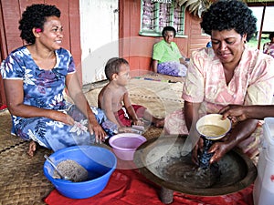 Women making kava