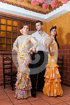 Women and man during the Feria de Abril on April Spain photo