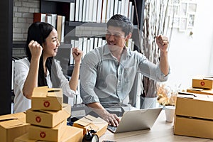 Women and men working on laptop computer at home office