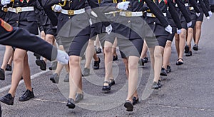 Women in military uniform at a military parade