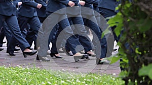 Women in military uniforms march across the parade ground on a cloudy summer day. Federal Service for the Execution of