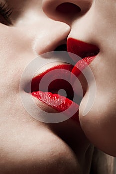 Women mouths kissing