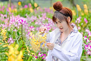Women Orchid Researchers are exploring and documenting the characteristics of orchids in the garden