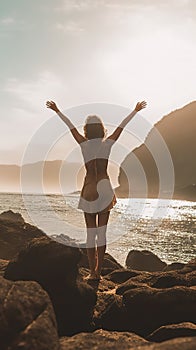 Women with outstretched arms enjoying the wind