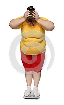 Women with overweight on scales