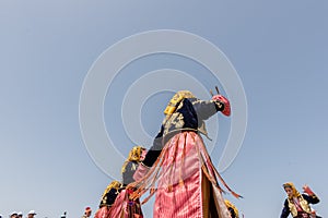 women perform a traditional folklore dance