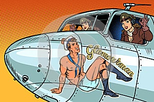 Women pilots girls. Pinup man on the fuselage of a retro bomber