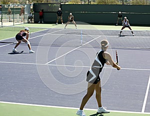 Women playing doubles