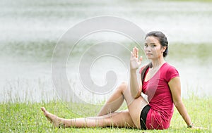 Women playing yoga at the river,peaceful place,natural location