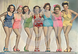 Women posing in bathing suits photo