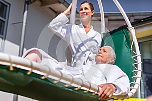 Women realxing on lounger in spa